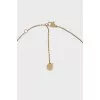 Gold necklace with a pin