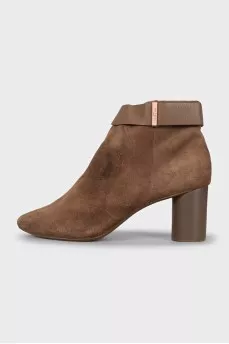 Brown suede ankle boots with a zipper
