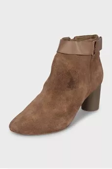 Brown suede ankle boots with a zipper