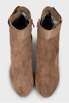 Brown suede ankle boots with a zipper