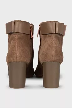 Brown suede ankle boots with a zipper