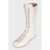 White leather lace-up boots