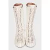 White leather lace-up boots