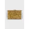 Acrylic clutch decorated with gold glitter