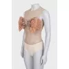 Beige bodysuit with a voluminous bow