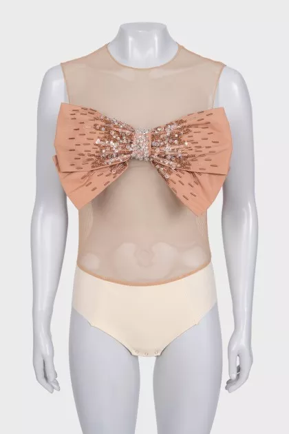 Beige bodysuit with a voluminous bow