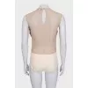 Beige bodysuit with a voluminous bow