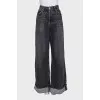 Gray flared jeans with patch pockets