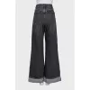 Gray flared jeans with patch pockets