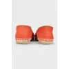 Orange moccasins with embroidery