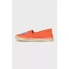 Orange moccasins with embroidery