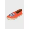Orange moccasins with embroidery