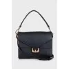 Leather shoulder bag with patch pockets