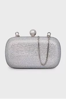 Clutch on a chain decorated with crystals