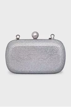 Clutch on a chain decorated with crystals