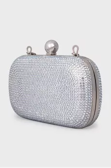 Clutch on a chain decorated with crystals