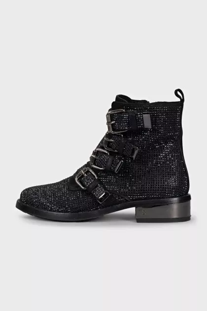 Black suede boots decorated with rhinestones