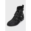 Black suede boots decorated with rhinestones