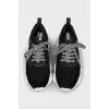 Black lace-up sneakers