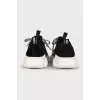 Black lace-up sneakers