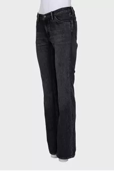 Black flared jeans with patch pockets