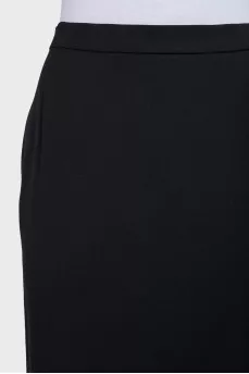 Asymmetrical wool skirt with a slit