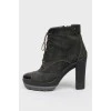 Ankle boots with patent toecap