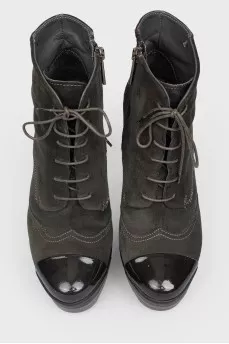 Ankle boots with patent toecap