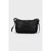 Rectangular leather bag with magnetic clasp