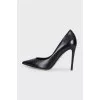 Black leather pumps