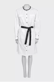 White dress with a belt and tag