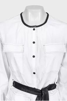 White dress with a belt and tag