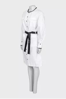 White dress with a belt and tag