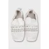 Woven leather moccasins