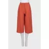 Orange cropped trousers