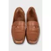 Leather loafers with gold hardware