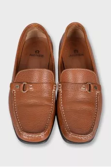 Leather loafers with gold hardware