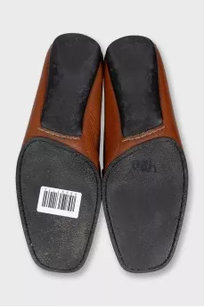 Leather loafers with gold hardware