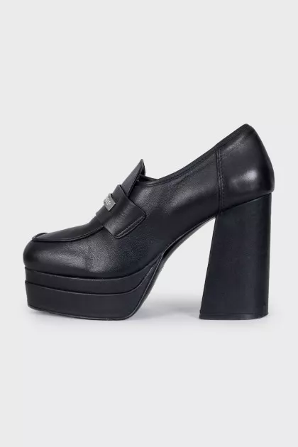 Black leather shoes with chunky heels