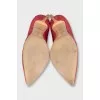 Pink snakeskin pumps