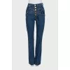 Blue high-waisted jeans with buttons