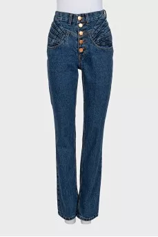 Blue high-waisted jeans with buttons