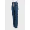 Blue high-waisted jeans with buttons