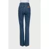 Blue high-waisted jeans with buttons