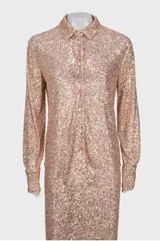 Pink suit decorated with sequins