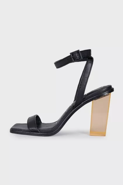 Black leather sandals with clear heels
