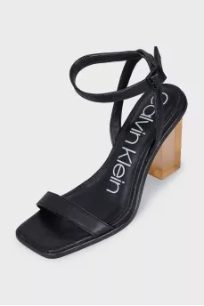 Black leather sandals with clear heels