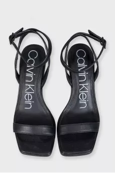 Black leather sandals with clear heels