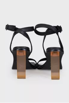 Black leather sandals with clear heels