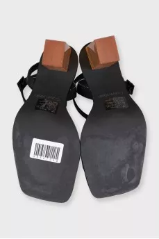 Black leather sandals with clear heels
